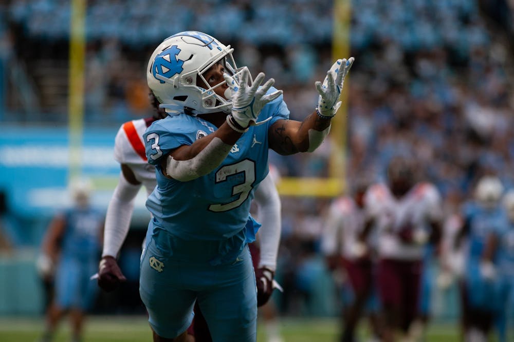 UNC senior wide receiver Antoine Green (3) reaches for a pass during a home football game at Kenan Stadium against Virginia Tech on Saturday, Oct. 1, 2022.