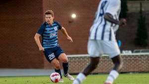 UNC sophomore midfielder Tim Schels (28) maintains posession of the ball at the UNC v. Georgia Southern game at Dorrance Field on Sept. 3.