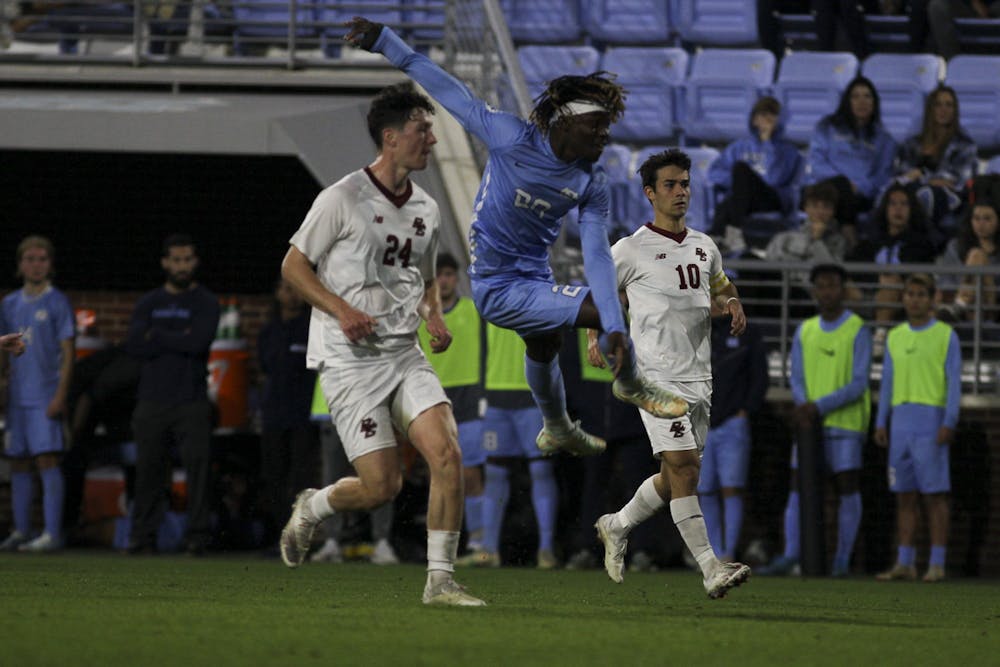 UNC junior midfielder/forward Ernest Bawa (20) kicks the ball during the game against Boston College at Dorrance Field on Wednesday, Nov. 2, 2022. UNC beat Boston College 1-0.
