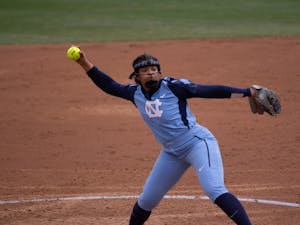 UNC softball sophomore Hannah George (42) gets ready to pitch the ball during the last game of the ACC Big 10 Challenge versus Wisconsin on Sunday, Feb. 16, 2020. UNC lost 8-3.