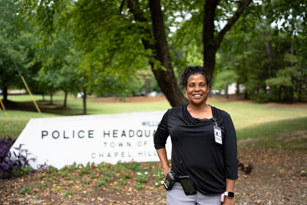 Laverne Burton, city crisis unit counselor, poses for a portrait in front of the Chapel Hill Police Department on Thursday, July 7, 2022.