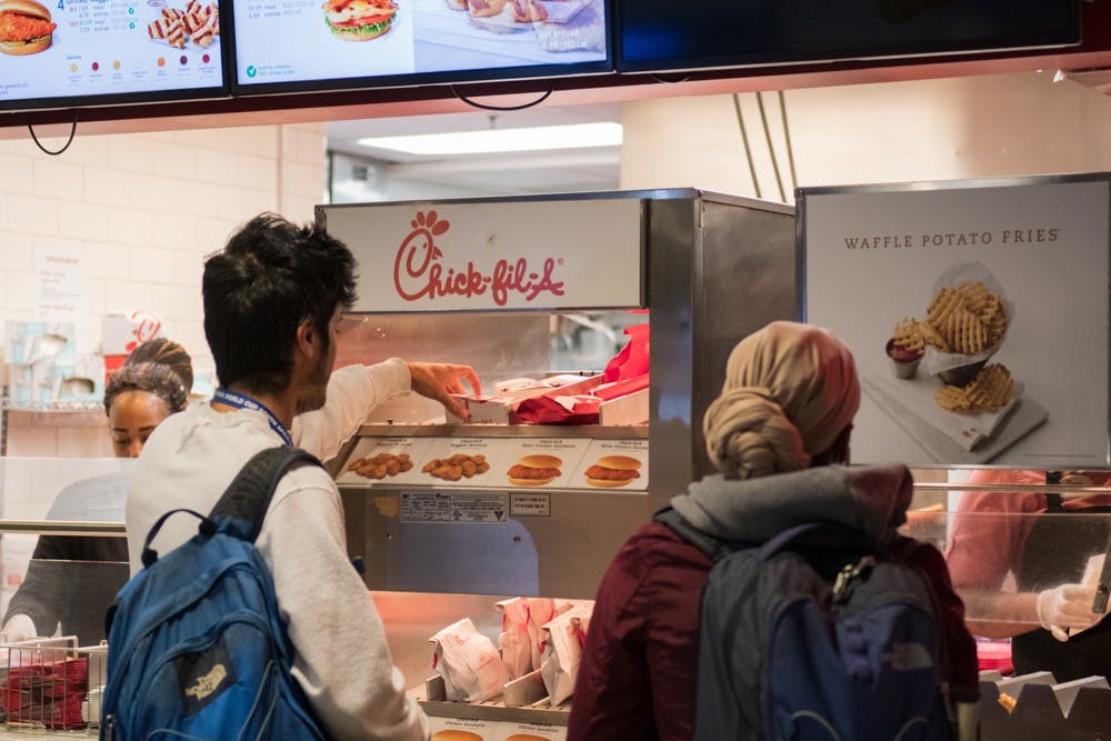 <p>UNC students stand in line to dine in the only onsite Chick-Fil-A located at the bottom of Lenoir. On Monday, Nov. 18, 2019, the fast-food chain announced it would stop donating to the Salvation Army and the Fellowship of Christian Athletes due to criticism they've received for opposing LBGTQ+ rights.&nbsp;</p>