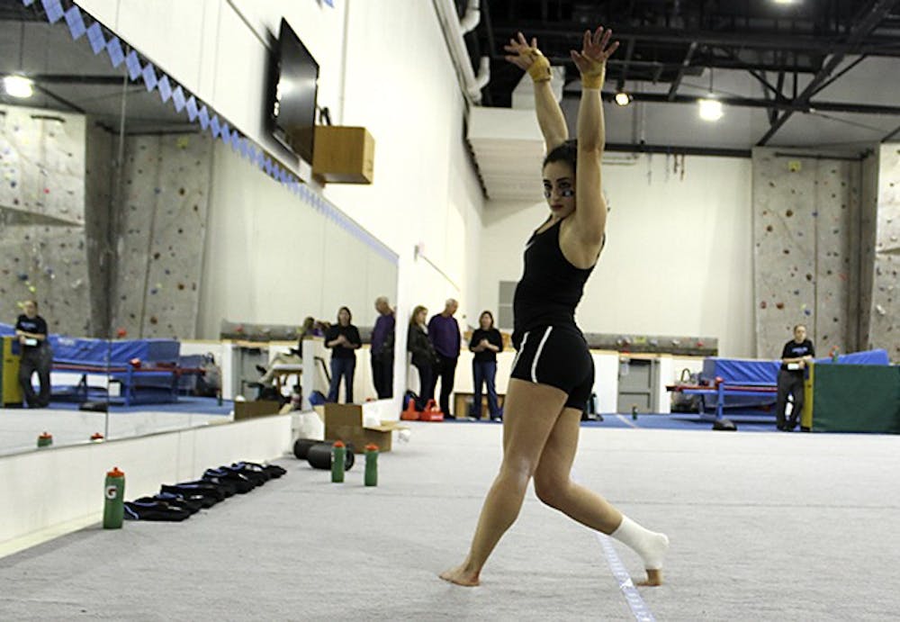 Lexi Cappalli poses during her floor routine during Thursday afternoon's practice at Fetzer gym.