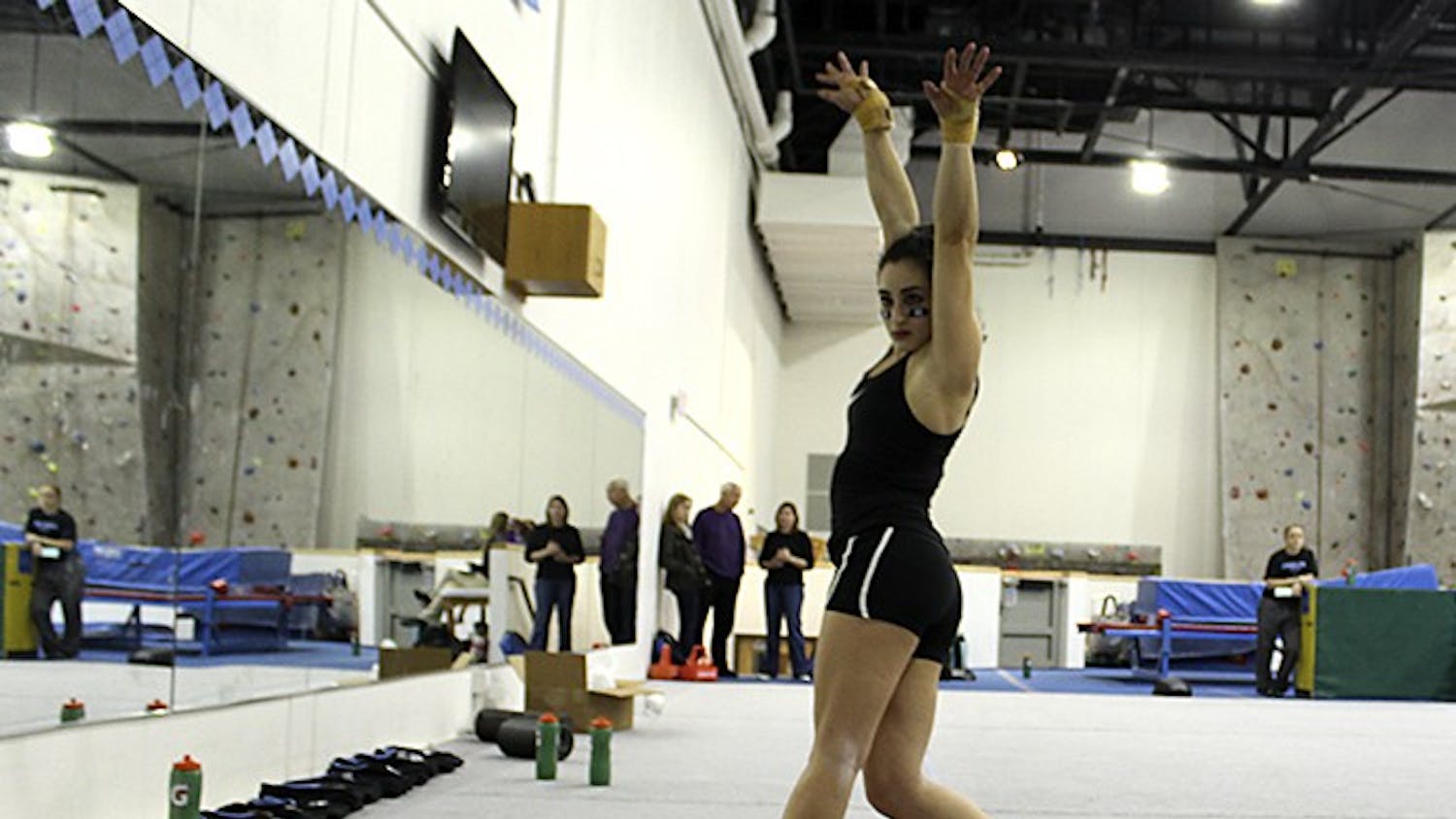 Lexi Cappalli poses during her floor routine during Thursday afternoon's practice at Fetzer gym.