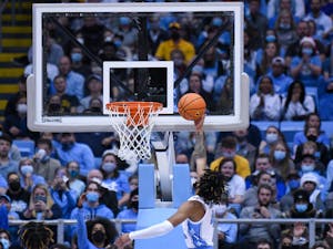 Sophomore guard RJ Davis (4) scores a point at the game against Appalachian State in the Dean E. Smith Center on Dec 21, 2021. UNC won 70-50.