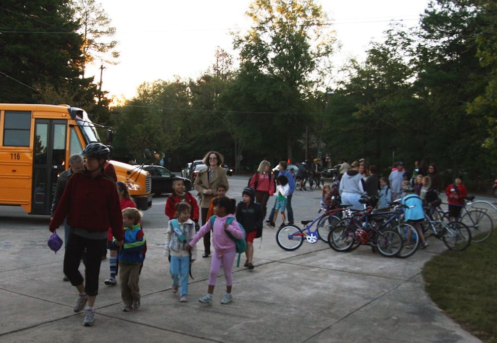 Children and parents of Carrboro Elementary School take part in International Walk to School Day on Wednesday morning. This is the sixth year Chapel Hill-Carrboro City Schools has participated in the event. 