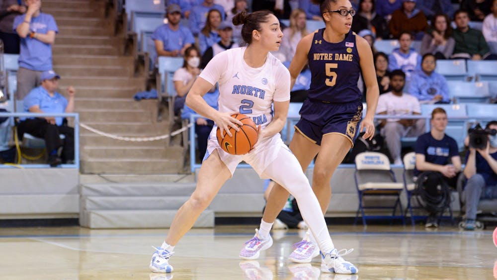 <p>First-year guard Paulina Paris (2) looks to make a pass against Notre Dame on Sunday, Jan 9, 2023, at Carmichael Arena. UNC beat Notre Dame 60-50. Photo courtesy of UNC Athletic Communications.</p>