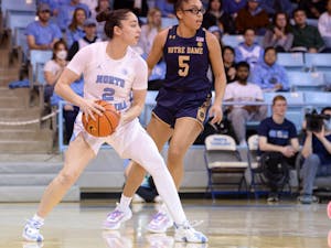 First-year guard Paulina Paris (2) looks to make a pass against Notre Dame on Sunday, Jan 9, 2023, at Carmichael Arena. UNC beat Notre Dame 60-50. Photo courtesy of UNC Athletic Communications.