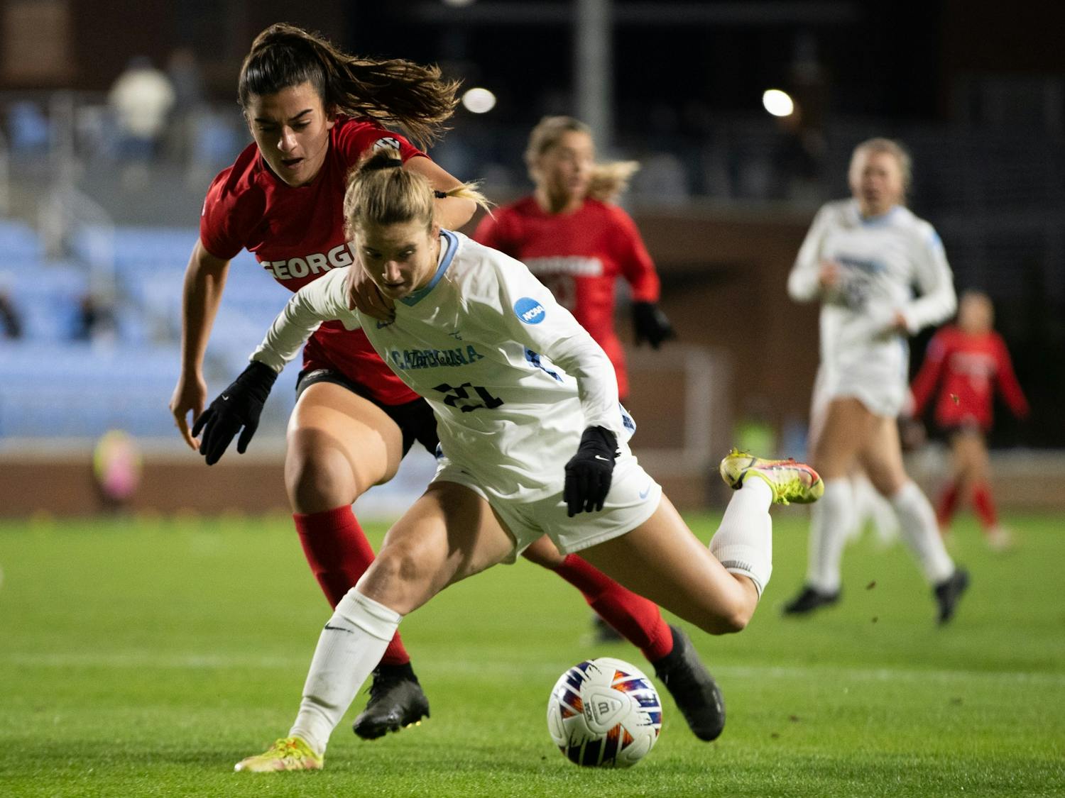 UNC redshirt first-year Ally Sentnor (21) protects the ball during the women's soccer game against Georgia on Thursday, Nov. 17, 2022, at Dorrance Field. UNC beat Georgia 3-1.