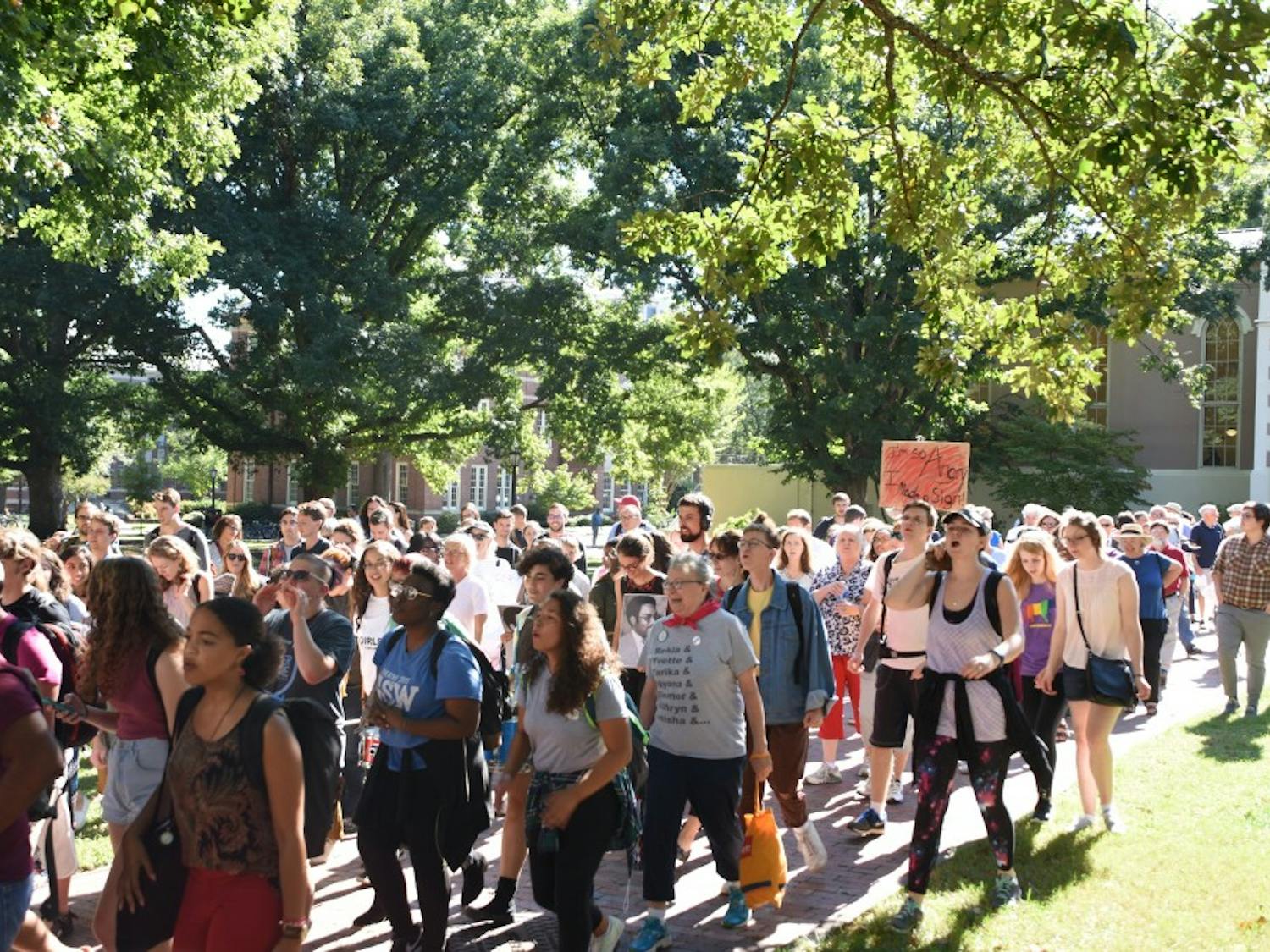 Protestors march from South Building to Silent Sam during the Solidarity Rally and March for the Center for Civil Rights Thursday.&nbsp;