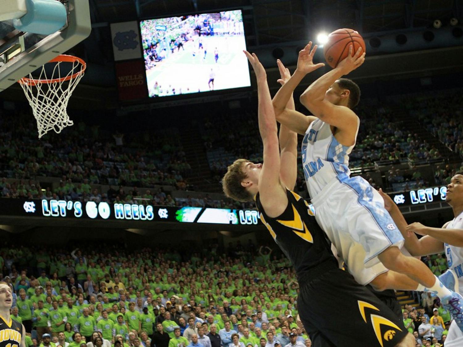 UNC junior guard Marcus Paige (5) flies in for a shot during the second half.