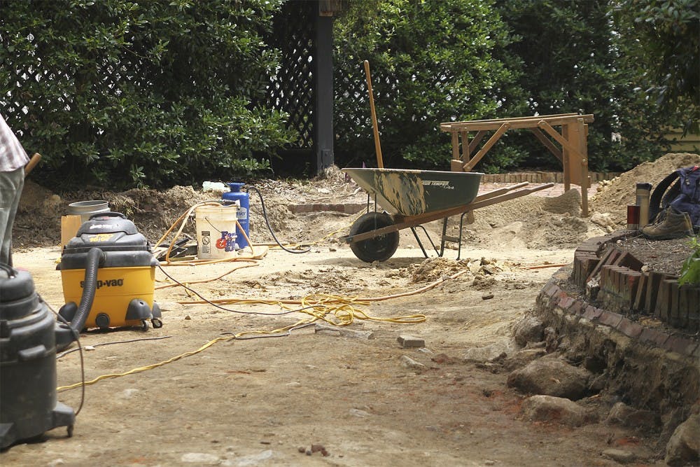 While doing construction work at UNC President Tom Ross's house on Franklin Street the remains of the original house were discovered under the driveway. Professors and graduate students from UNC's Research Laboratories of Archaeology work to unearth ruins from the site.