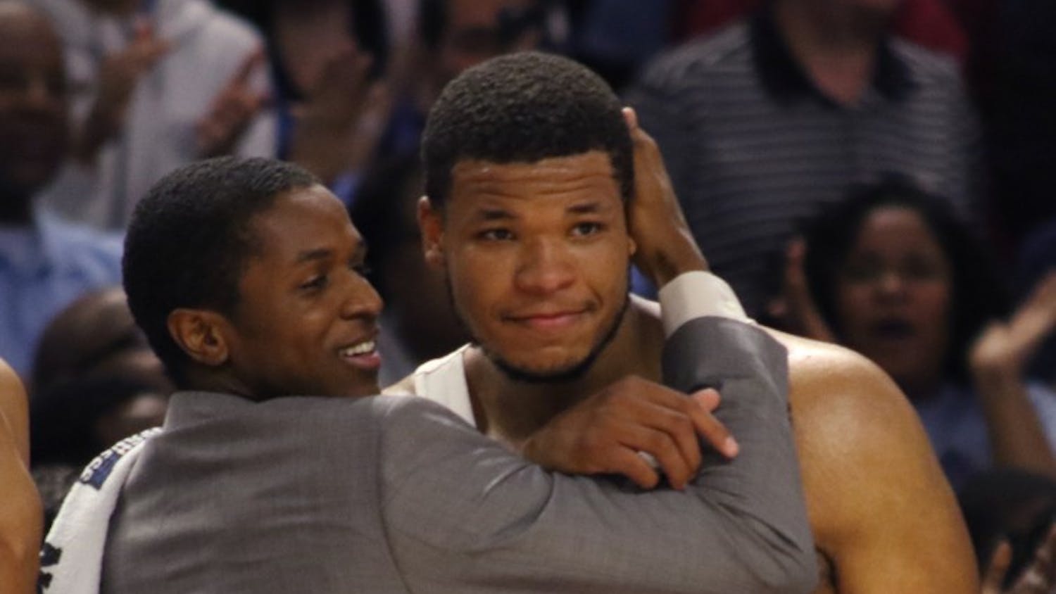 North Carolina forward Kennedy Meeks (3) is embraced by guard Kenny Williams on the bench at the end of the team's victory of Arkansas in the second round of the NCAA Tournament in Greenville on Sunday.