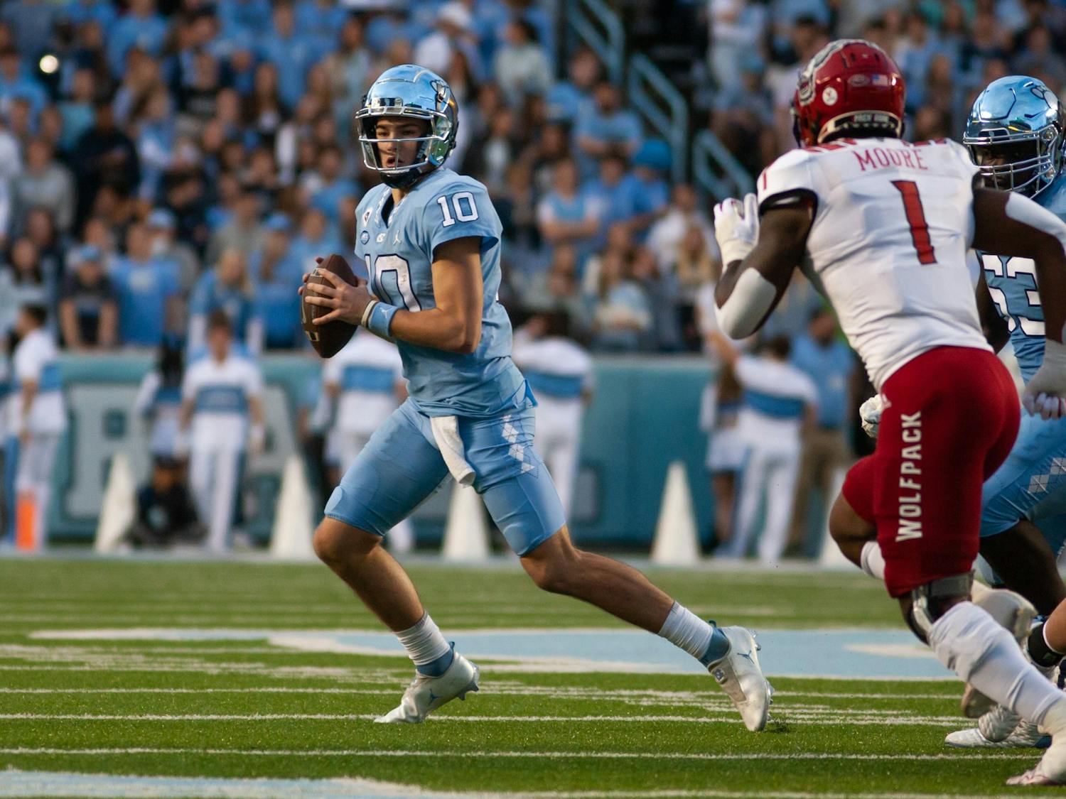 UNC red-shirt first-year, Drake Maye (10), throws a pass in Kenan Stadium on Nov. 25, 2022, as the Tar Heels face off against the NC State Wolfpack.