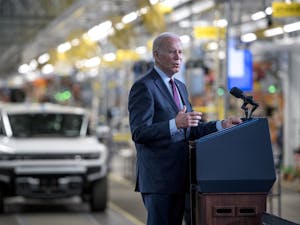 U.S. President Joe Biden speaks at the General Motors Factory ZERO electric vehicle assembly plant on Wednesday, Nov. 17, 2021 in Detroit. Biden was in town to tout the benefits of the infrastructure bill he signed two days ago that allocates $1 trillion for, among other things, adding electric vehicle charging stations around the country as companies like GM retool away from the internal combustion engine.  Photo courtesy of Nic Antaya/Getty Images/TNS.