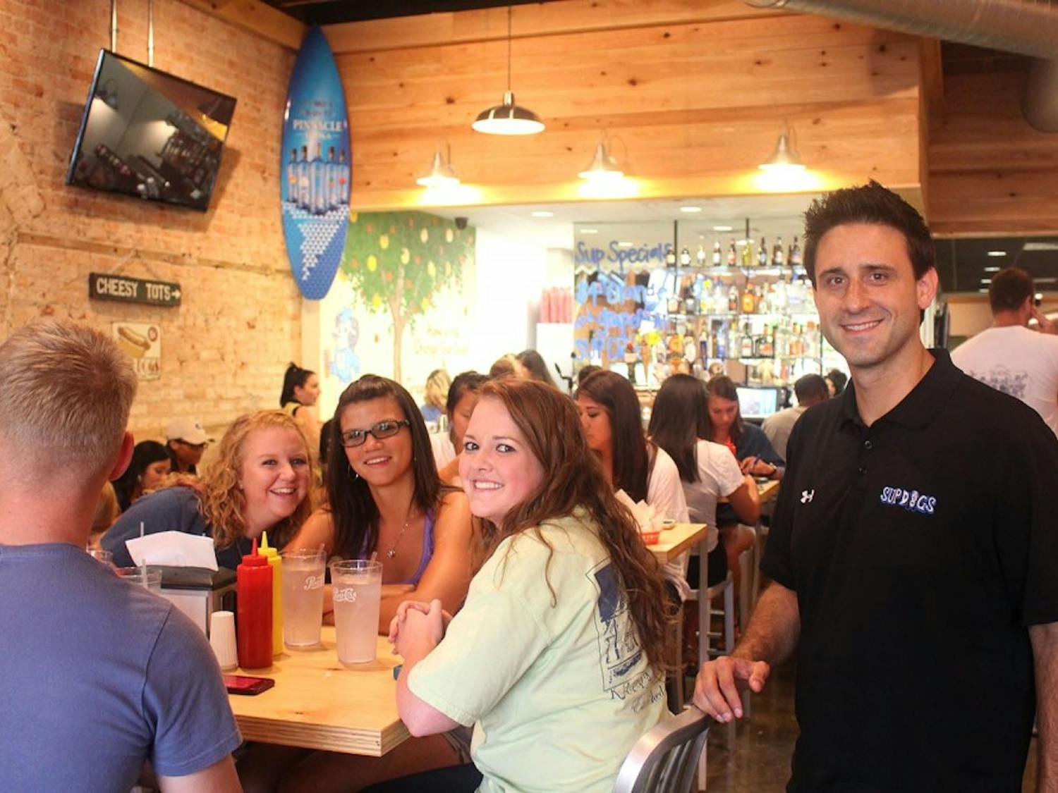 When&nbsp;Sup Dogs on Franklin Street opened, owner Bret Oliverio welcomed new patrons as they came in the door.