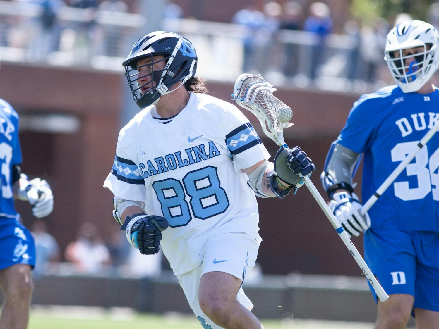 UNC junior defensive midfielder Alex Breschi (88) opens a play during a home game against Duke at Dorrance Field on Saturday Apr. 2, 2022.