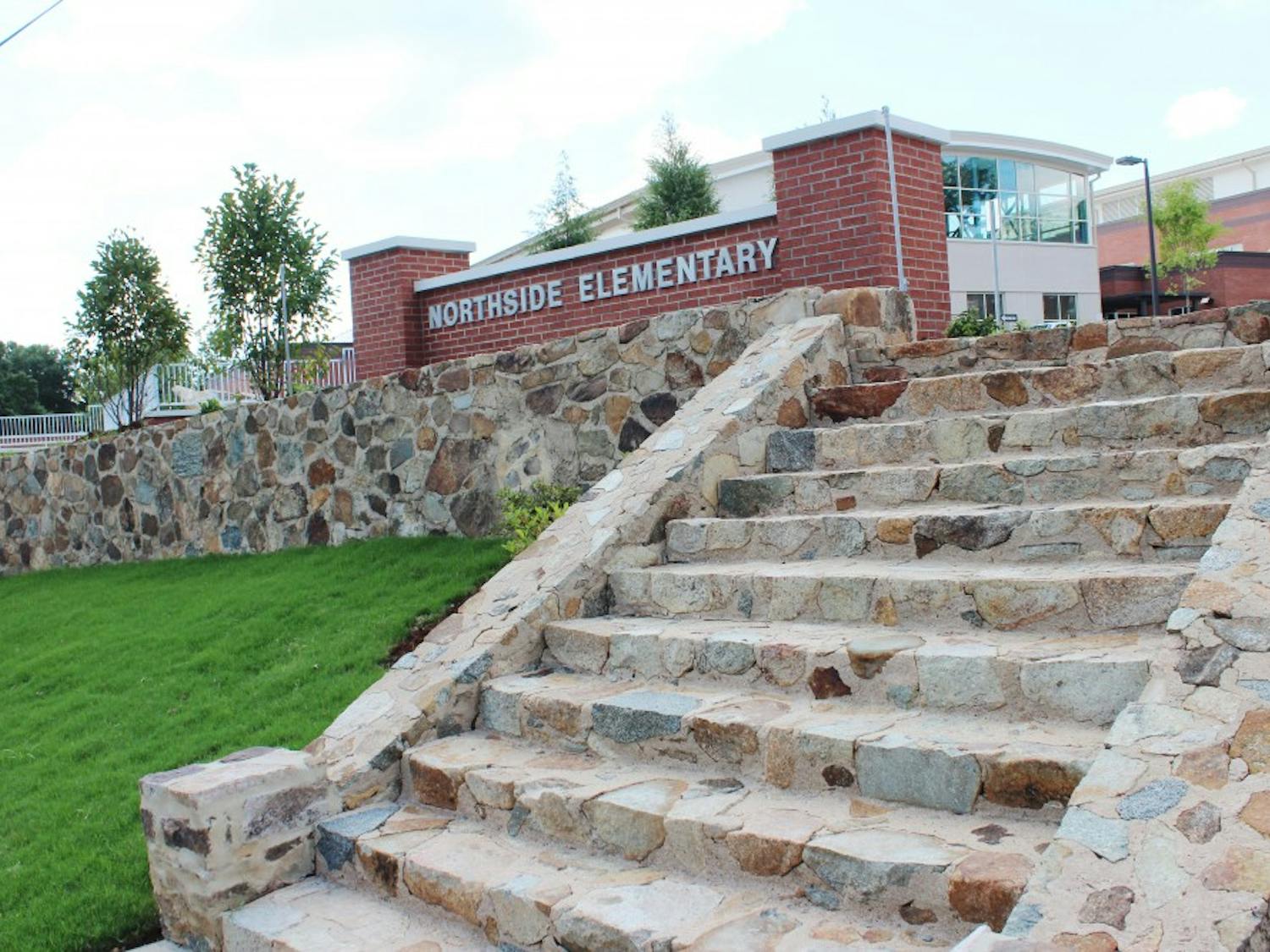 	Architects at the new Northside Elementary preserved the original school&#8217;s stone wall and steps.