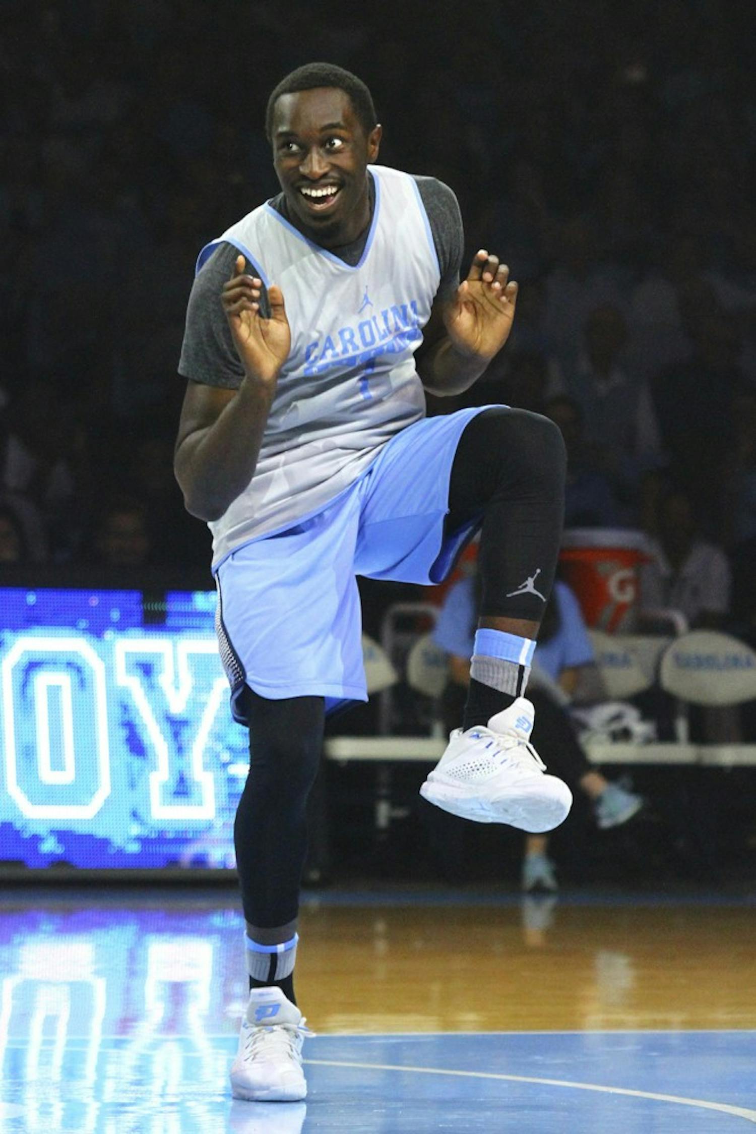 Theo Pinson (1) participated in a dance off against teammate Joel Berry at Late Night With Roy on Friday night.
