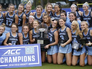 The UNC field hockey team poses for a picture after winning the ACC championship against Wake Forest on November 4, 2018 at Karen Shelton Stadium. UNC beat Wake Forest 7-2. The team also won the 2017 ACC championship as well. 