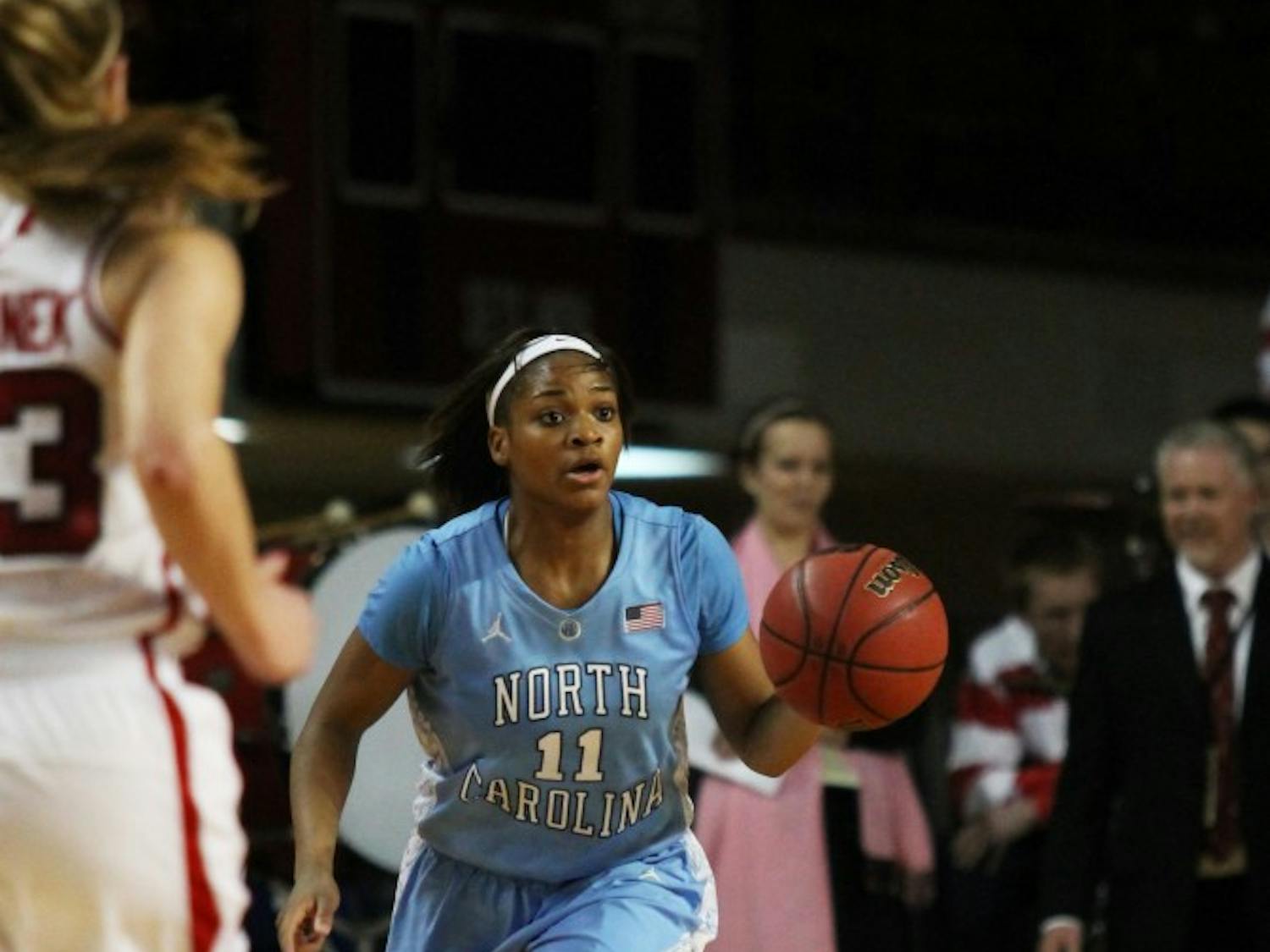 	Brittany Rountree brings the ball up the court against the NC State defense.