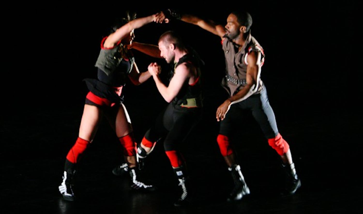 Three dancers from Pilobolus perform in “Redline,” the first act of the show.  DTH/Shar Narne Flowers