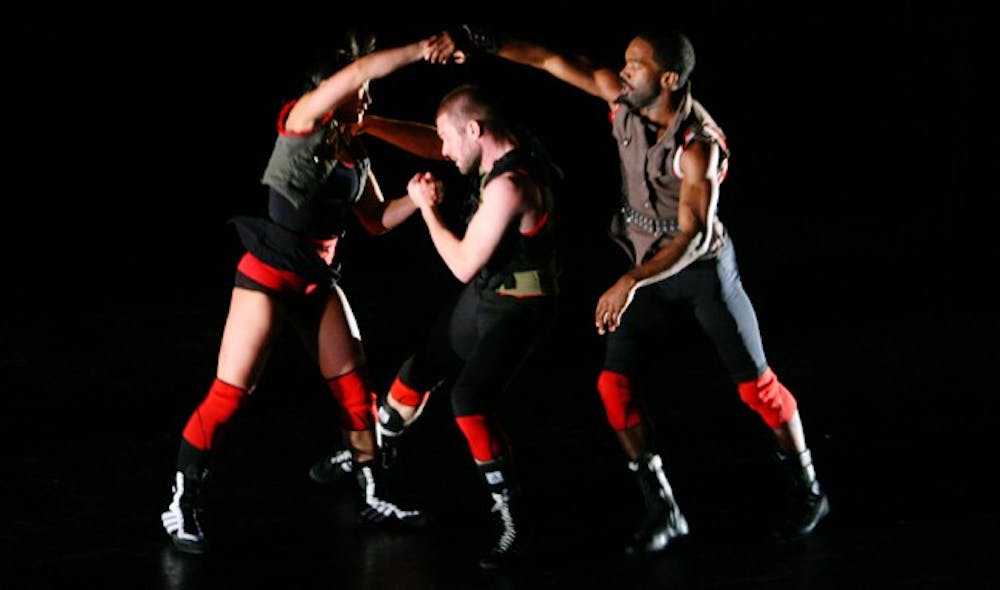 Three dancers from Pilobolus perform in “Redline,” the first act of the show.  DTH/Shar Narne Flowers