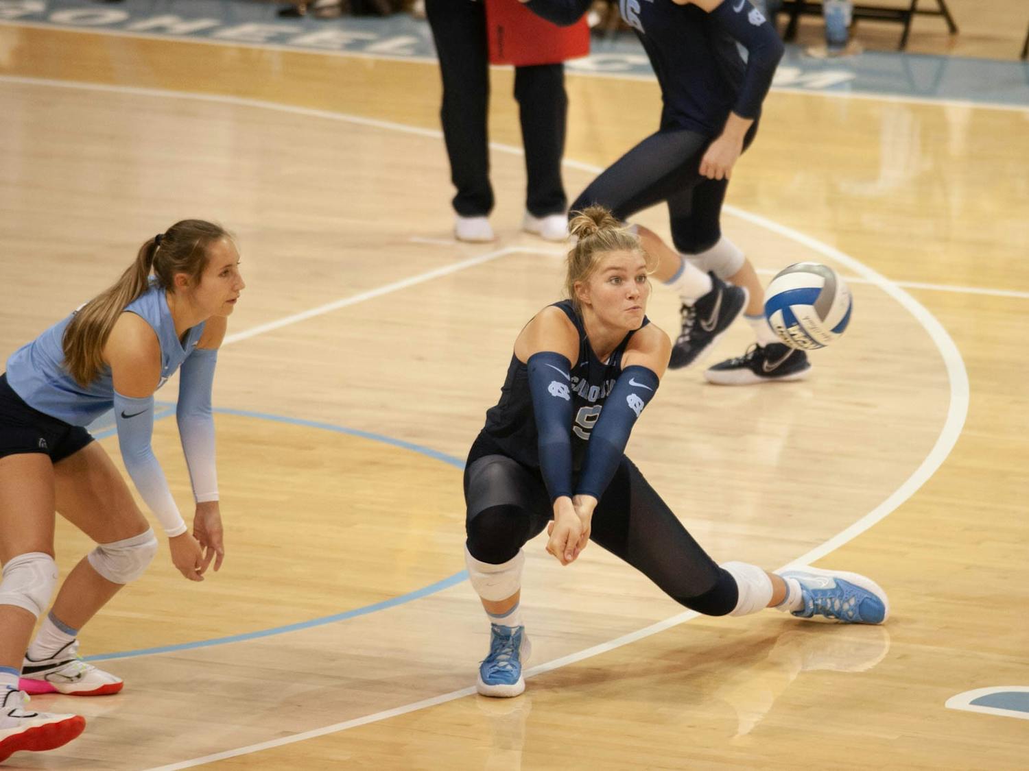First-year outside hitter Mabrey Shaffmaster (9) saves the ball in the UNC Women's volleyball game against Virginia Tech at the Woolen Gymnasium on Oct. 10. The Heels won 3-0.