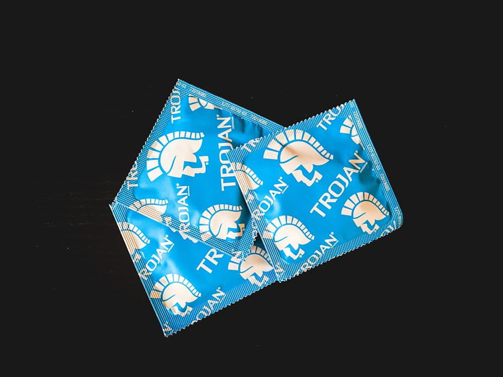 <p>DTH Photo Illustration. UNC provides free supplies at a variety of locations around campus to help students engage in safer sex, including condoms.</p>