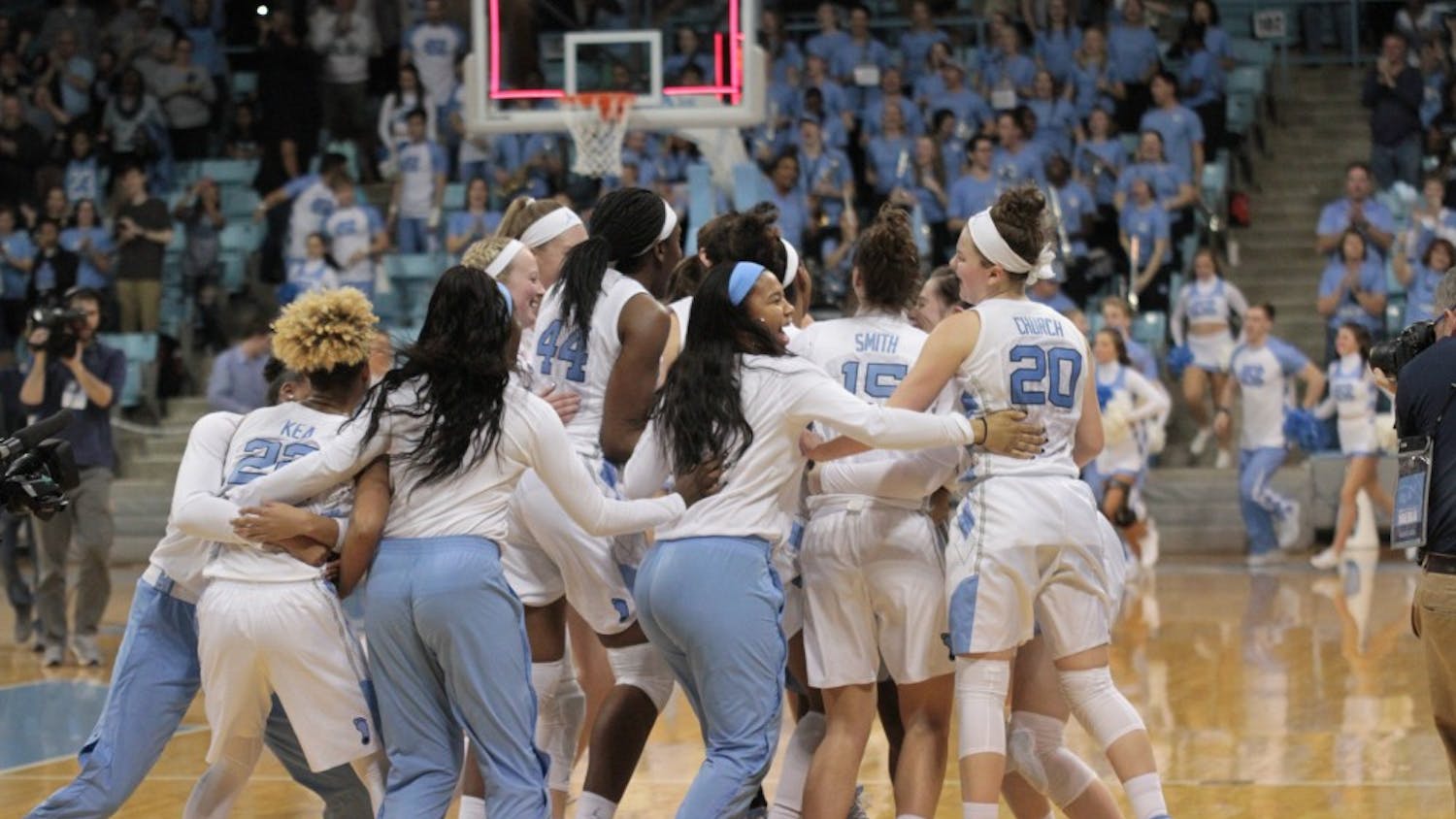 Women's basketball celebrates win over Duke
