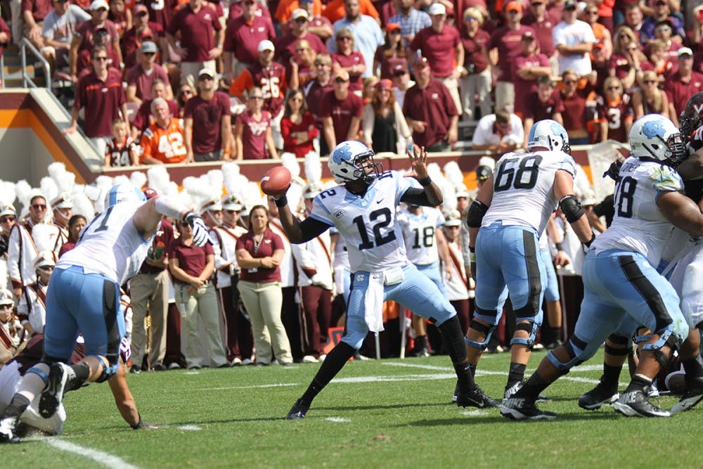	Marquise Williams drops back into the pocket to pass down the field.