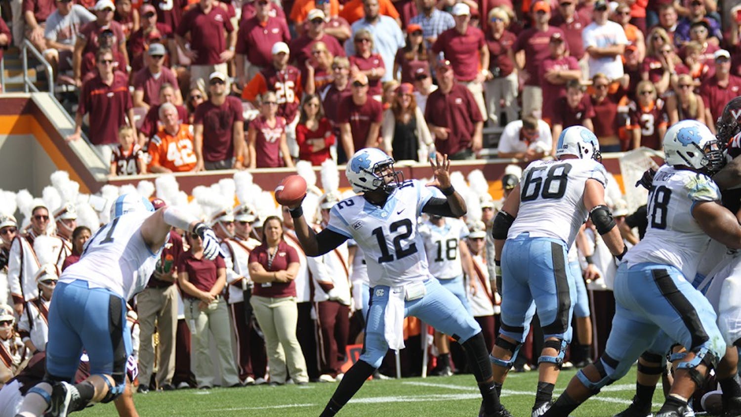 	Marquise Williams drops back into the pocket to pass down the field.