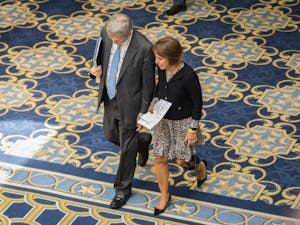 UNC Chancellor Carol Folt walks with Mark Merritt, vice chancellor and general council of UNC, through the Gaylord Opryland Resort &amp; Conference Center in Nashville, Tenn. during a lunch break Aug. 16, 2017.