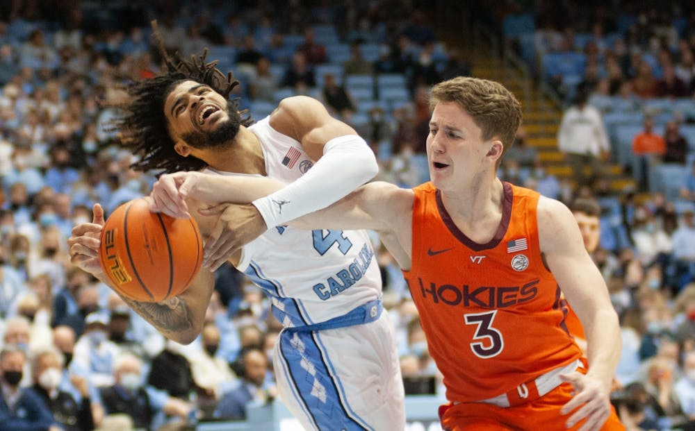 UNC sophomore guard RJ Davis goes for the rebound during UNC Men's basketball's home game against Virginia Tech on Monday, Jan. 24, 2022, at the Dean Smith Center.