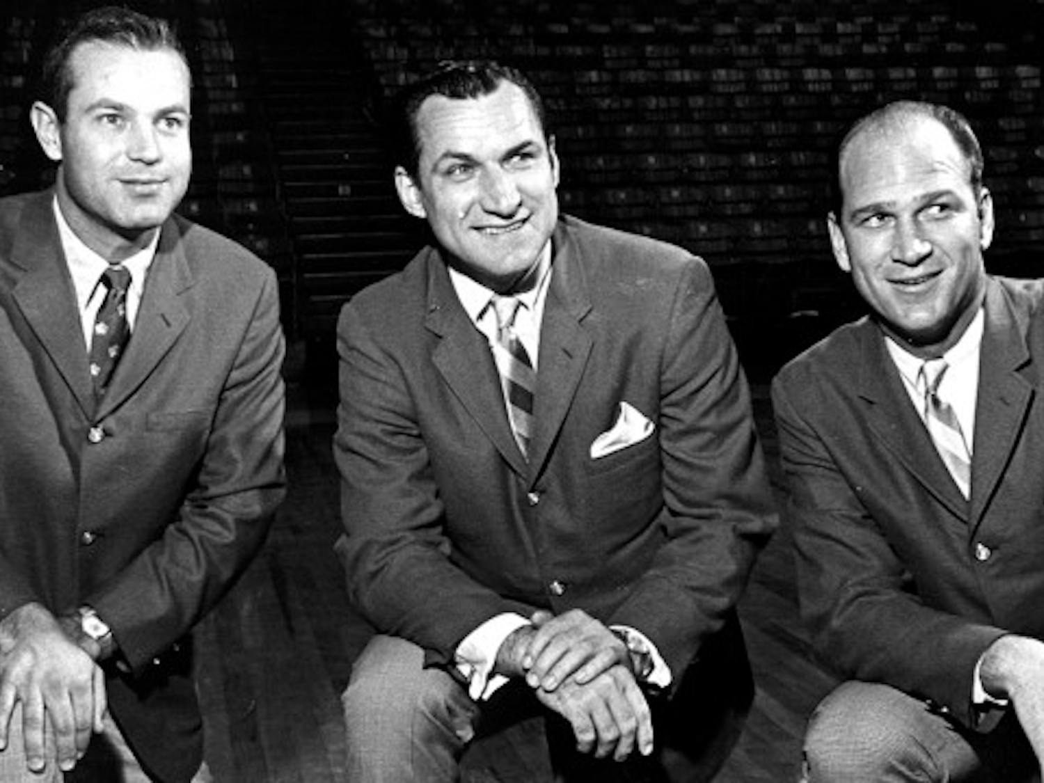 A young Guthridge with Dean Smith and John Lotz on the Tar Heel staff in the late 1960s.
