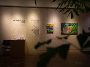 Pieces from the Art Unblocked 2021 exhibition hang on the walls of the Block Gallery in the Raleigh Municipal Building on Wednesday, Mar. 17, 2021. The exhibition feautures works of art created by emerging and established artists with disabilities.
