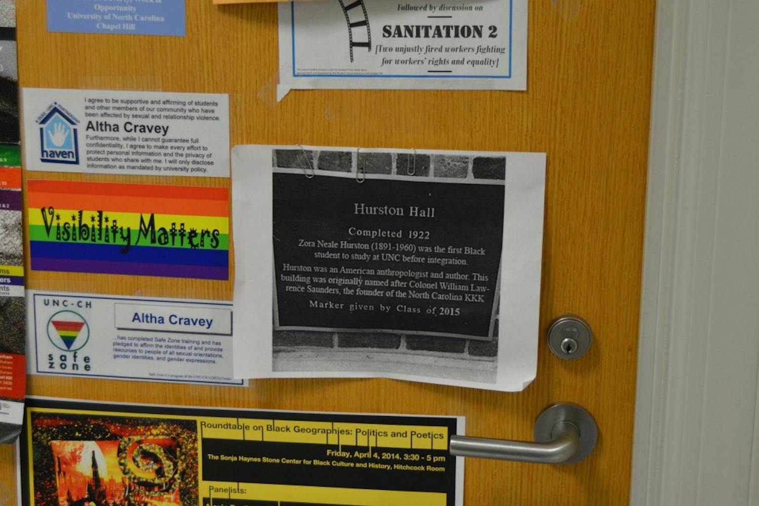 A sign outside of Professor Altha Cravey's office displays a sign for "Hurston Hall." 