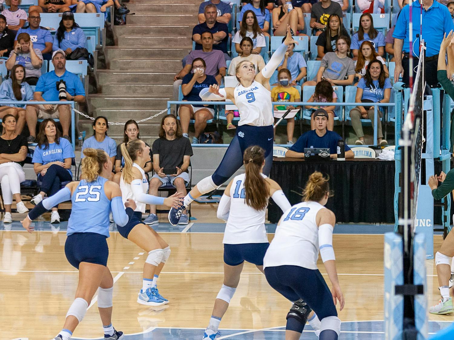 UNC sophomore outside hitter Mabrey Shaffmaster (9) hits the ball during the volleyball match against Michigan State on Friday, Sept. 9, 2022, at Carmichael Arena.  UNC beat Michigan State 3-0.