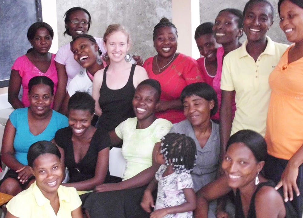 	<p>Reina Galjour (top row, fourth from left), a certified professional midwife and Orange County native, stands with her Haitian students.</p>