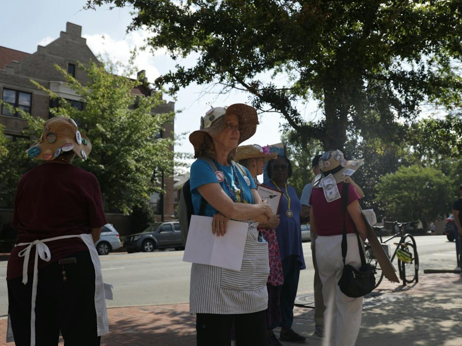 Members of the Raging Grannies, a local activist group, made an appearance at an NAACP rally in &nbsp;front of the old post office on Franklin St. Wednesday afternoon.