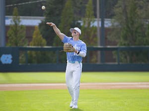 UNC junior infielder Mac Horvath (10) tosses the ball during the baseball game against VCU on Wednesday, March 1, 2023 at Boshamer Stadium. UNC won 14-10.