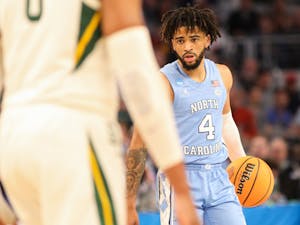 UNC sophomore guard RJ Davis (4) opens a possession during the second round of the NCAA tournament against Baylor on Saturday, March 19, 2022, in Fort Worth, Texas. UNC won 93-86.