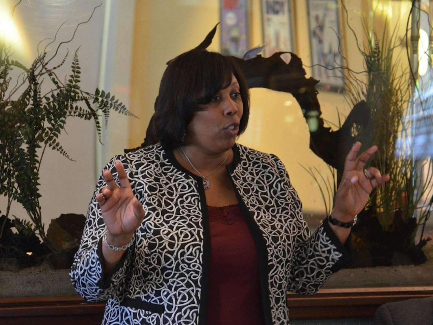Dr. Ingrid McCree, the athletic director at North Carolina Central, speaks with members of the Chapel Hill Sports Club at Squid's Restaurant on March 21.