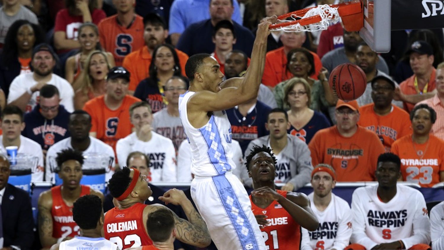 Brice Johnson (11) dunks the ball during the semi-final game against Syracuse in the NCAA Tournament.