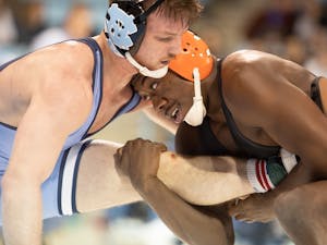 UNC redshirt senior A.C. Headlee and Princeton sophomore Quincy Monday wrestle in weight class 157 on Friday, Jan. 11, 2020 in Carmichael Arena. No. 17 UNC defeated No. 12 Princeton 25-11.