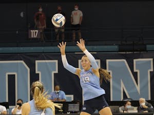 UNC graduate setter Emma Reynolds (19) returns a volley during a home match at Carmichael Arena on Sep. 17 against UNC Charlotte.