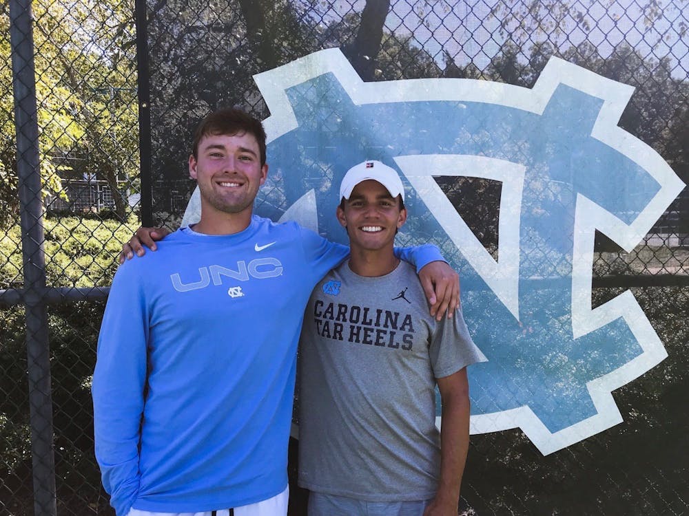 UNC first-year Casey Kania and junior Mark Dillon pictured after a match at the Elon Invitational on Sept. 26. Photo courtesy of UNC Athletic Communications. 
