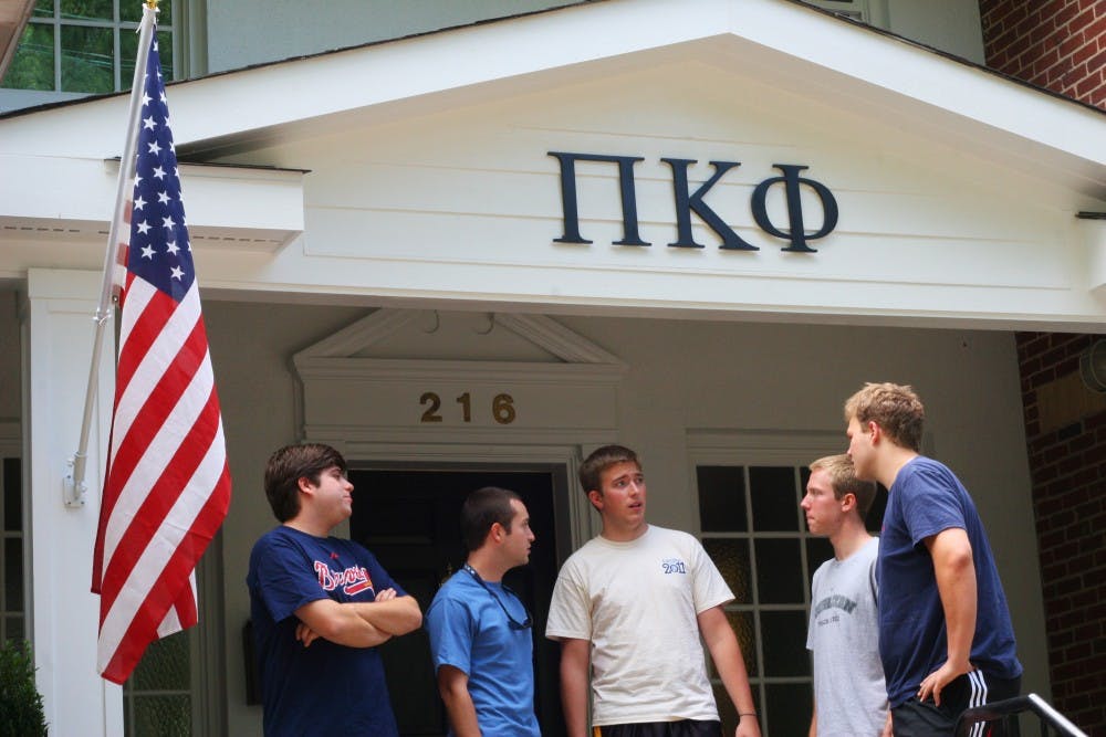 David Hamrick, RJ Yost, Tyler Aiken, Bradley Harrison, and Rudy Aguilar (left to right), members of Pi Kappa Phi talk outside of their new house at 216 E. Rosemary St.  The house is much closer to campus and has helped recruitment after improving the house this summer.