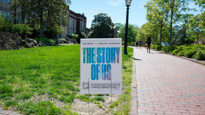 A sign promoting "The Story of Us" stands outside Phillips Hall on Wednesday, April 12, 2023.