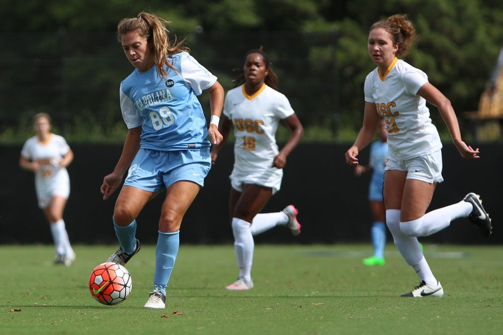 Sixth-year senior forward Alexa Newfield moves the ball upfield during Sunday’s game against Southern California as a part of the Duke Nike Classic.